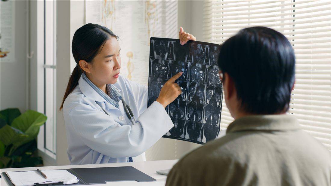 A man having his blood pressure measured at a health screening